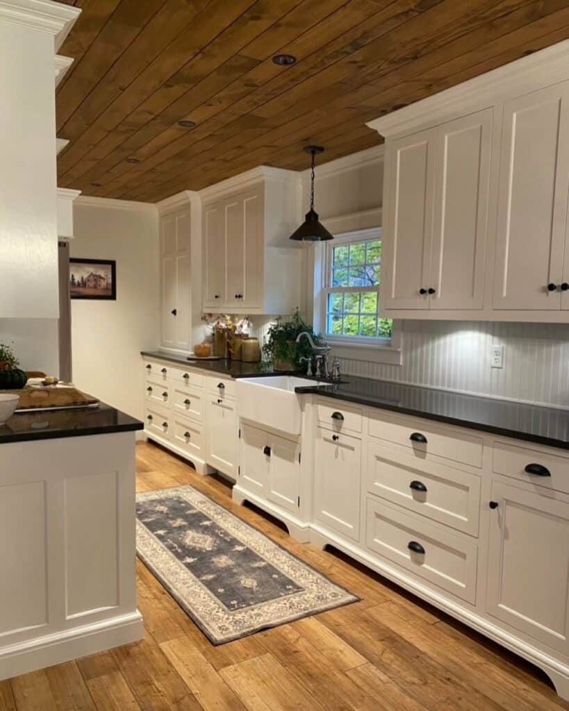White Kitchen With Wood Ceiling