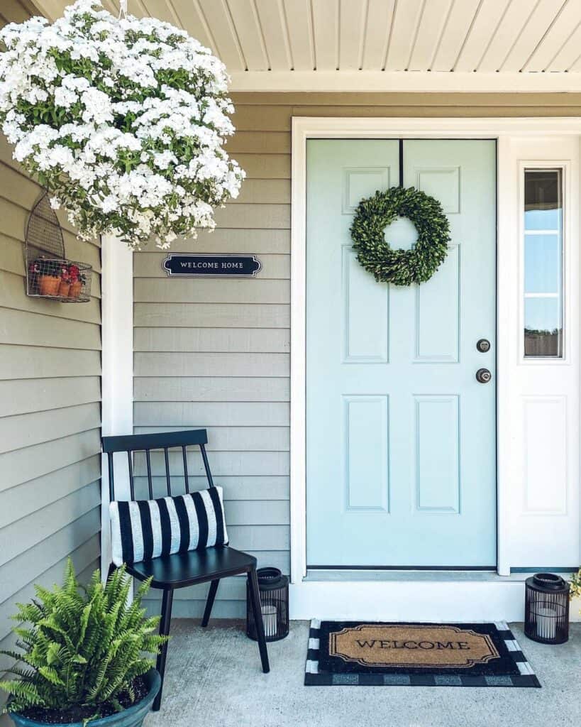 Blue Front Door With Summer Styling