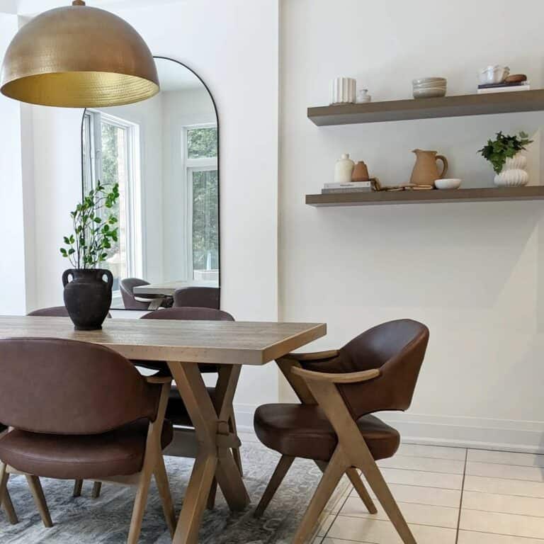 Brass Dome Pendant Light Over Wood Dining Table