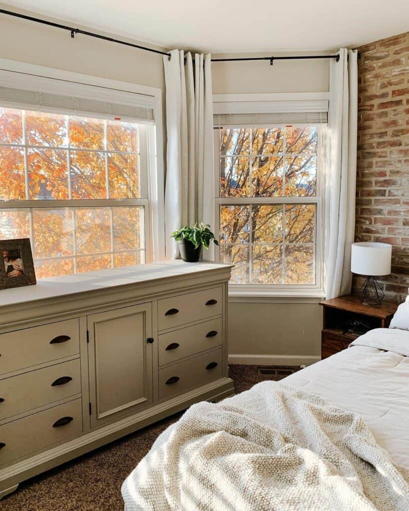 Brick Accent Wall Beside Bay Windows