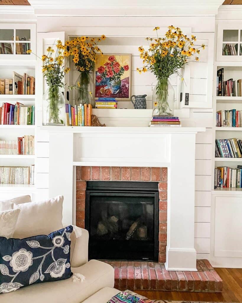 Brick Fireplace With Yellow Flower Mantel Décor