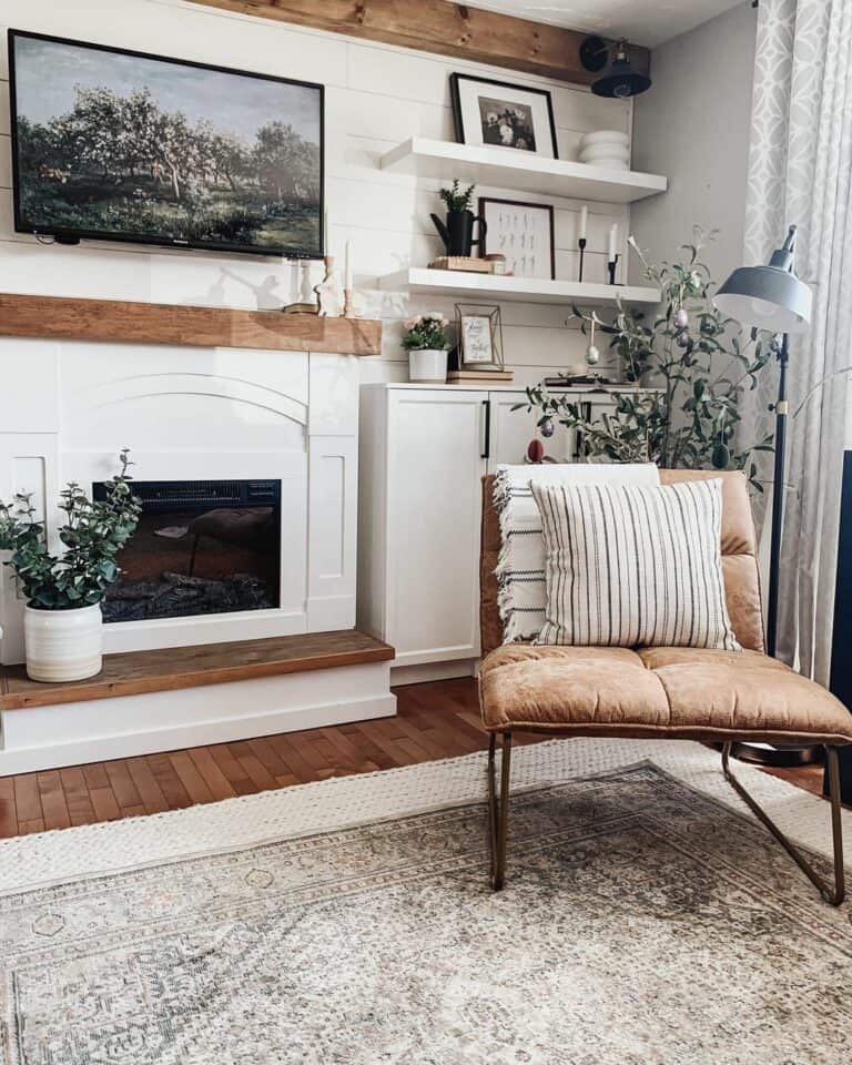 Brown and White Living Room With Layered Rugs