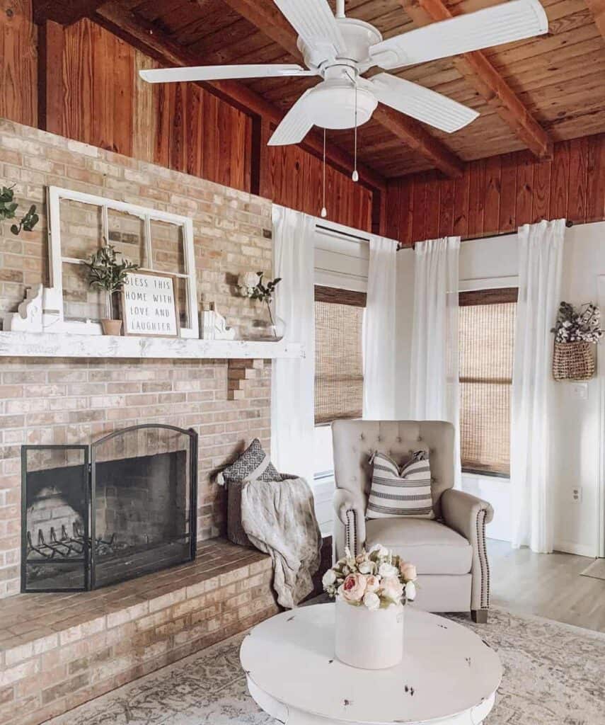 Brown and White Living Room With Wood Panel Ceiling