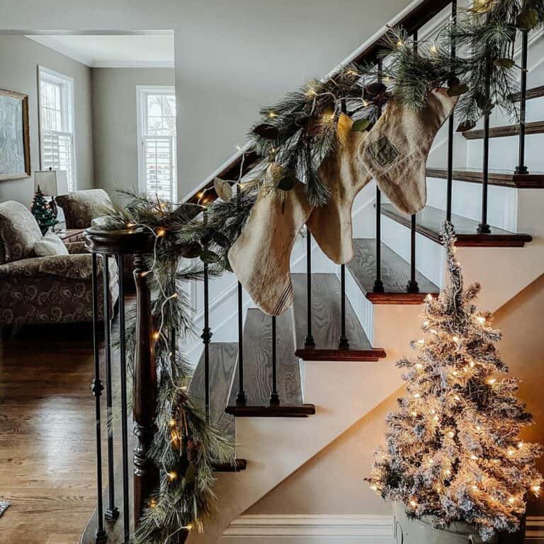 Burlap Christmas Stockings Along a Staircase