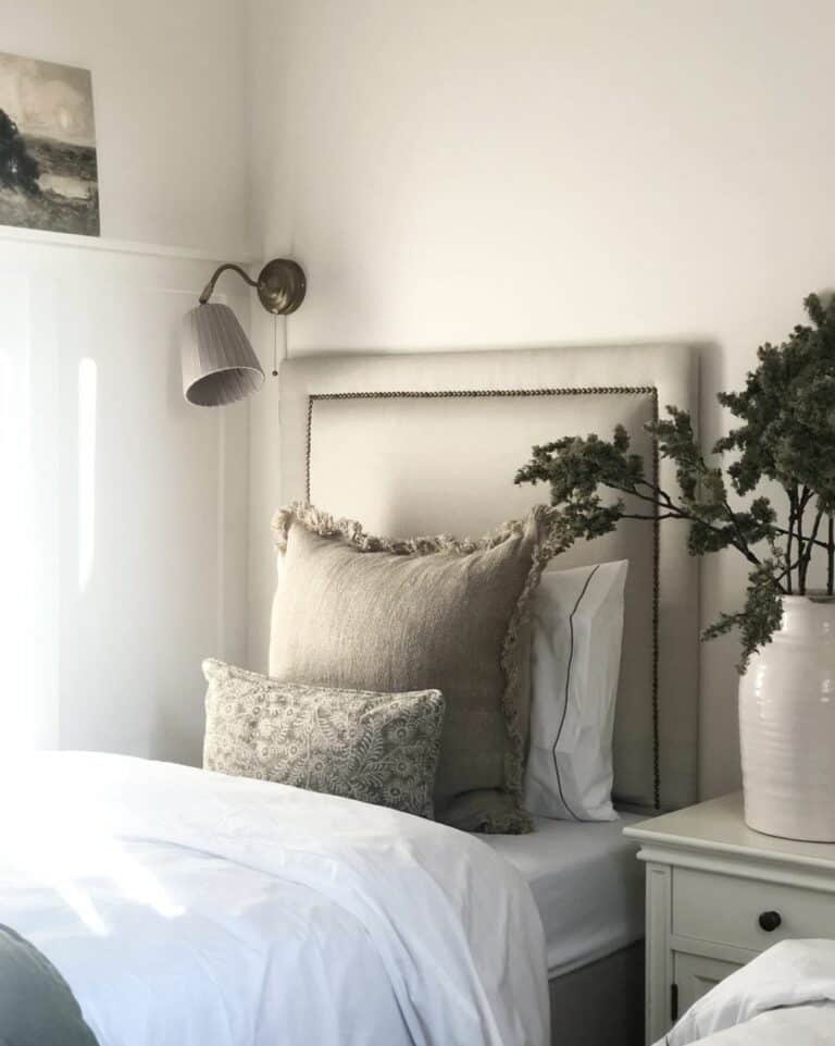 Calm Gray Bedroom With Wall Lamp