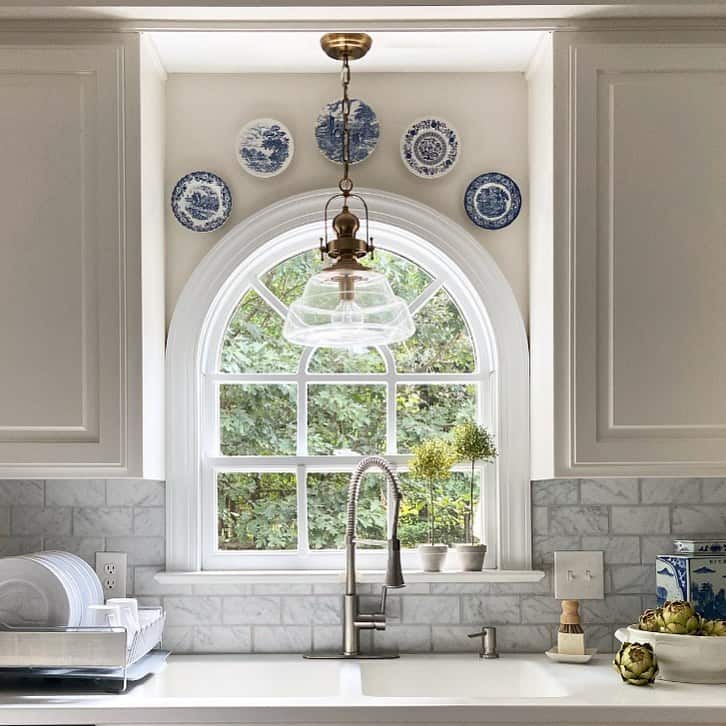 Charming Kitchen With Classic Arched Window