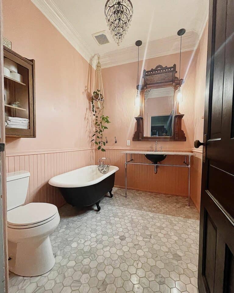 Cheerful Farmhouse Bathroom With Peach Walls and Neutral Flooring