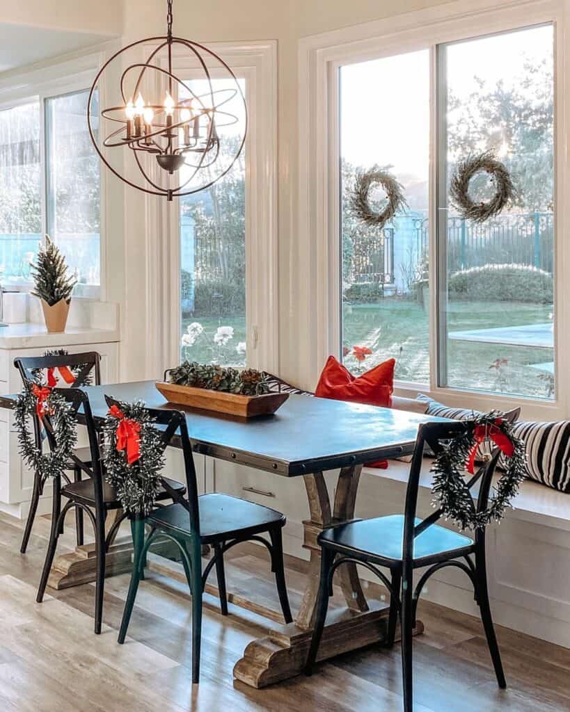 Christmas Wreaths on Windows and Kitchen Chairs