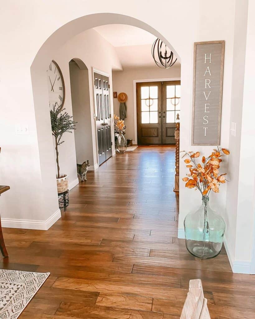 Clear Floor Vase Decoration Under Farmhouse Sign