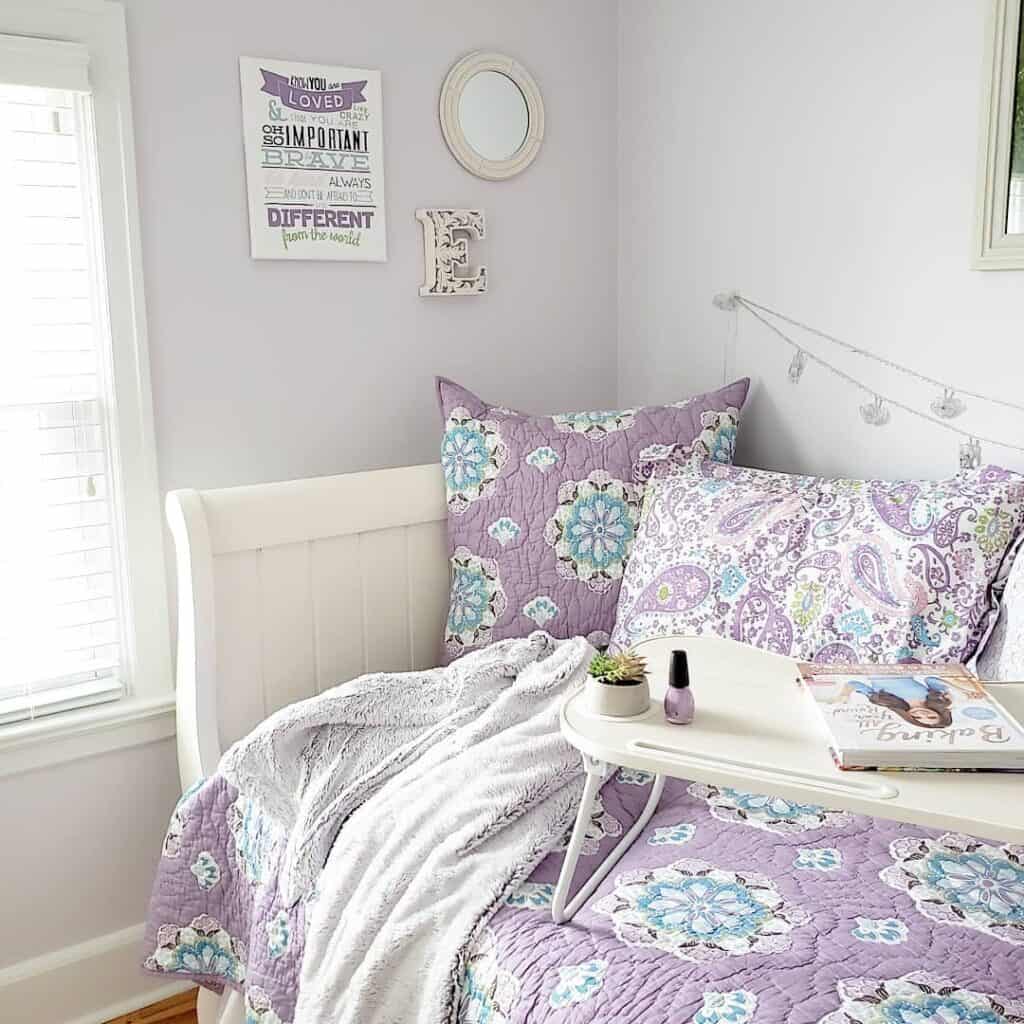 Colorful Bedding and White Bed Frame