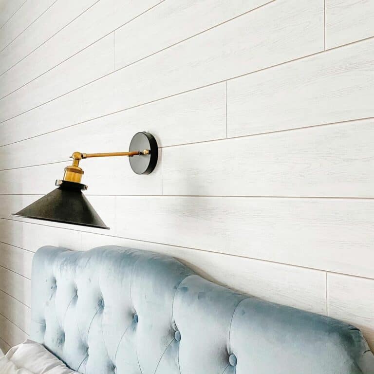 Contemporary Bedroom With Wooden Pattern-adorned Walls