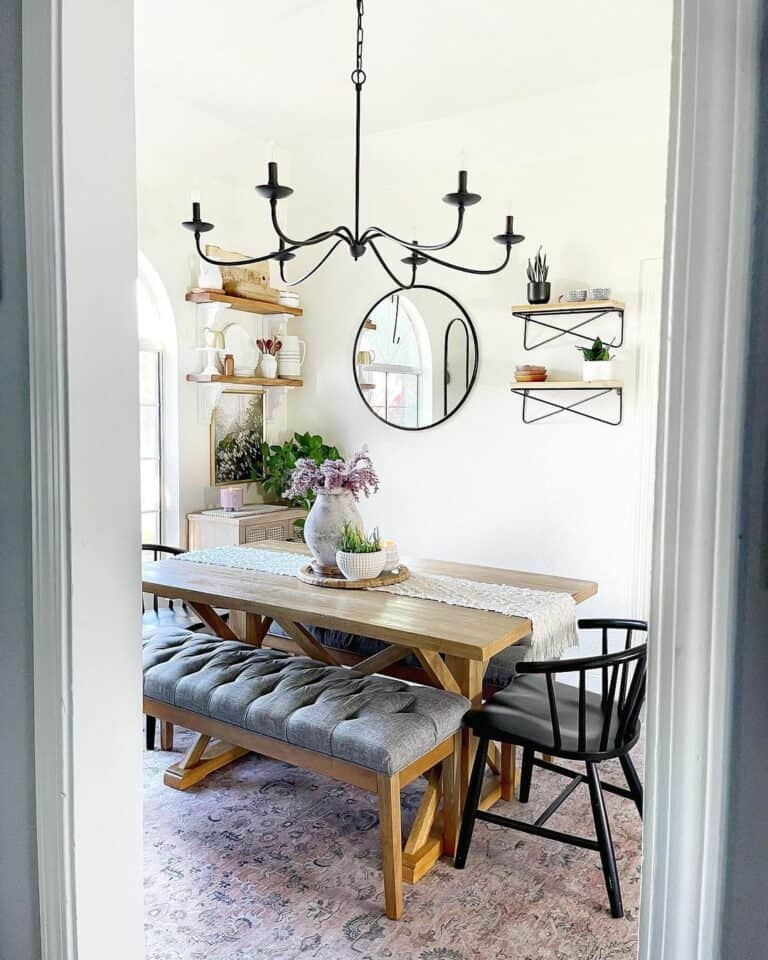 Contemporary Black Chandelier Over Wood Dining Table