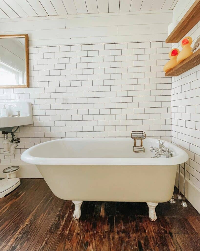 Cottage-inspired Bathroom With a  Clawfoot Bathtub