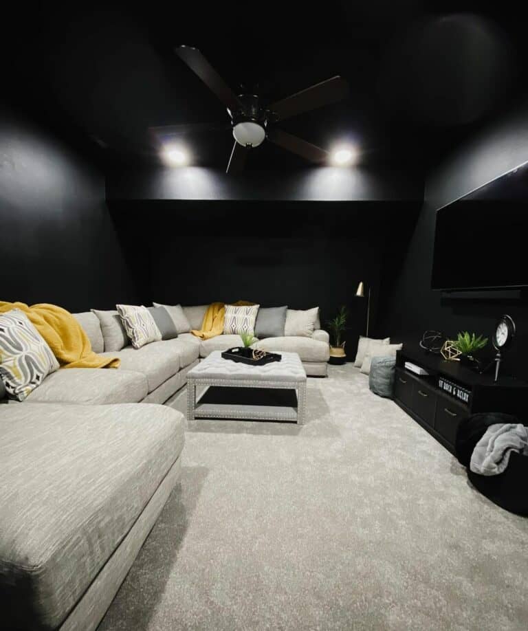 Cozy Black Living Room With a White Couch