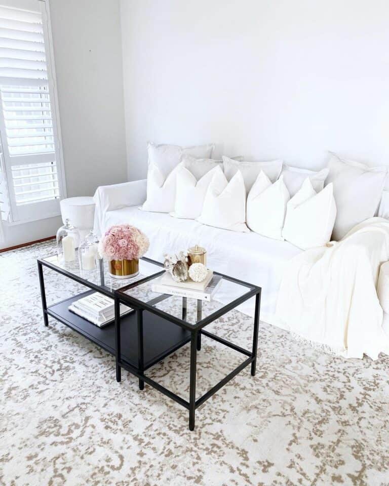 Cozy White Living Room With Black Coffee Table