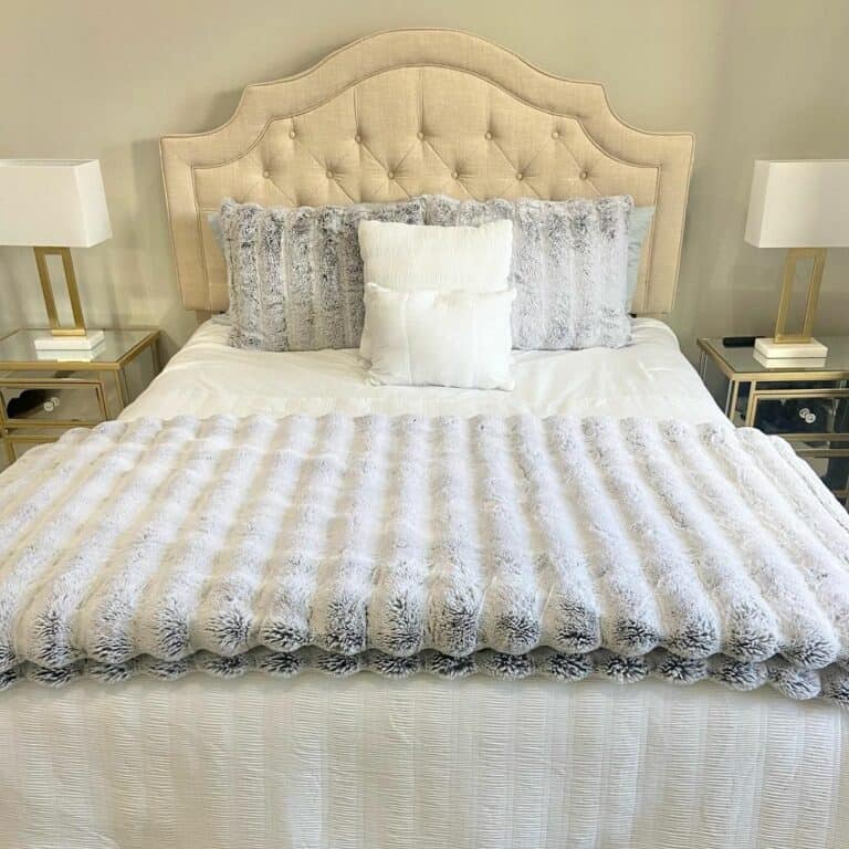 Cream-colored Tufted Headboard and Light Gray Pillows