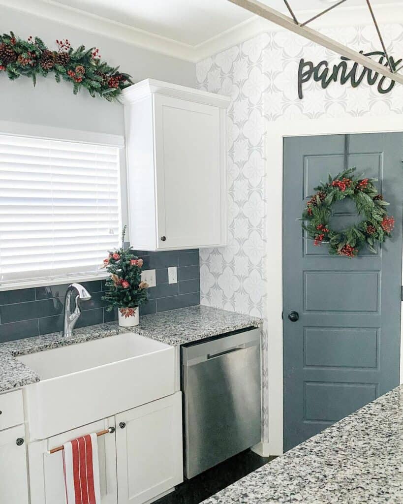 Dark Gray Pantry Door With Red Berry Wreath