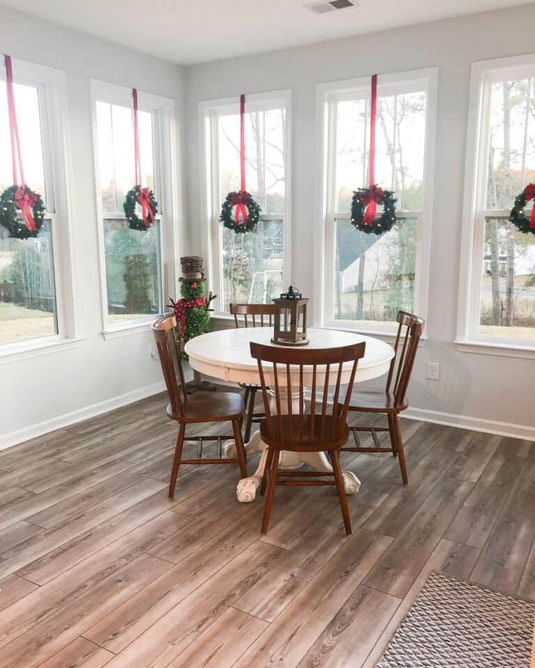 Dining Room With Christmas Wreaths on Windows