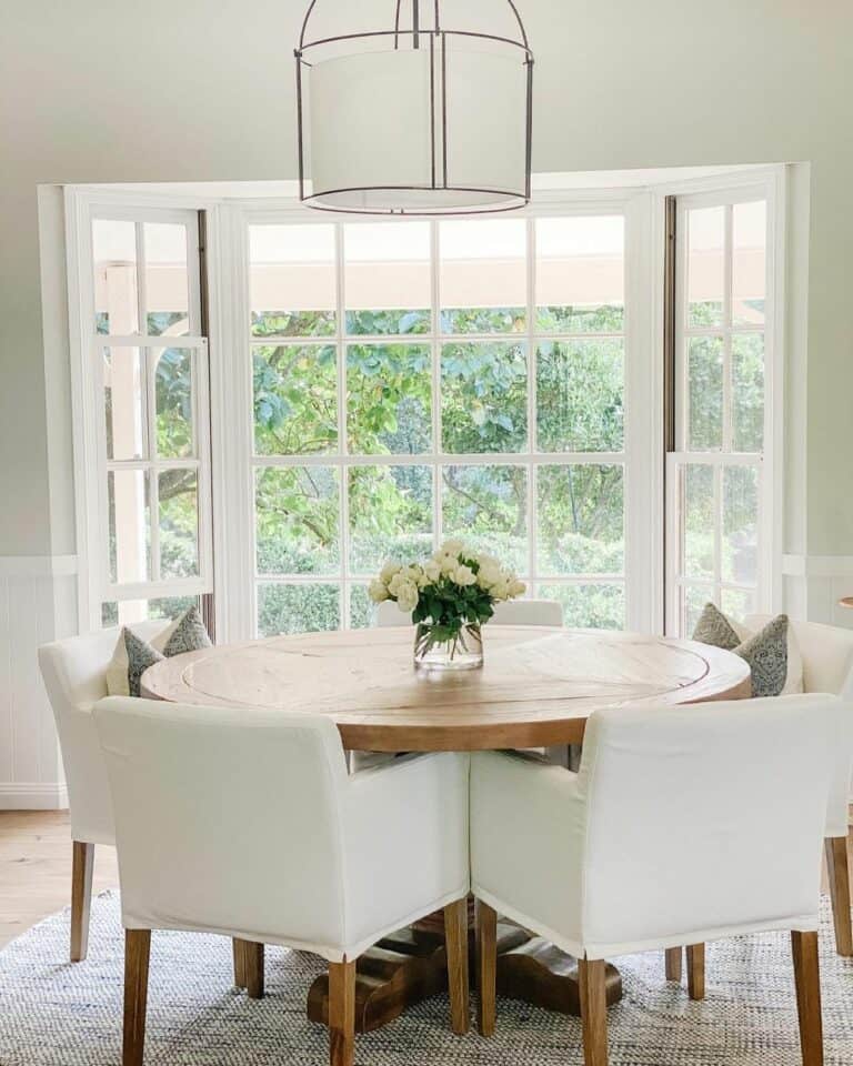 Dreamy Dining Room Bay Window With White Window Grids