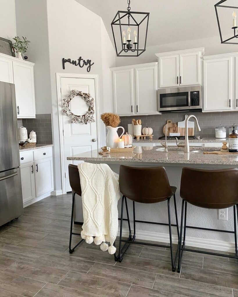 Eat-in Kitchen With Brown Leather Bar Stools