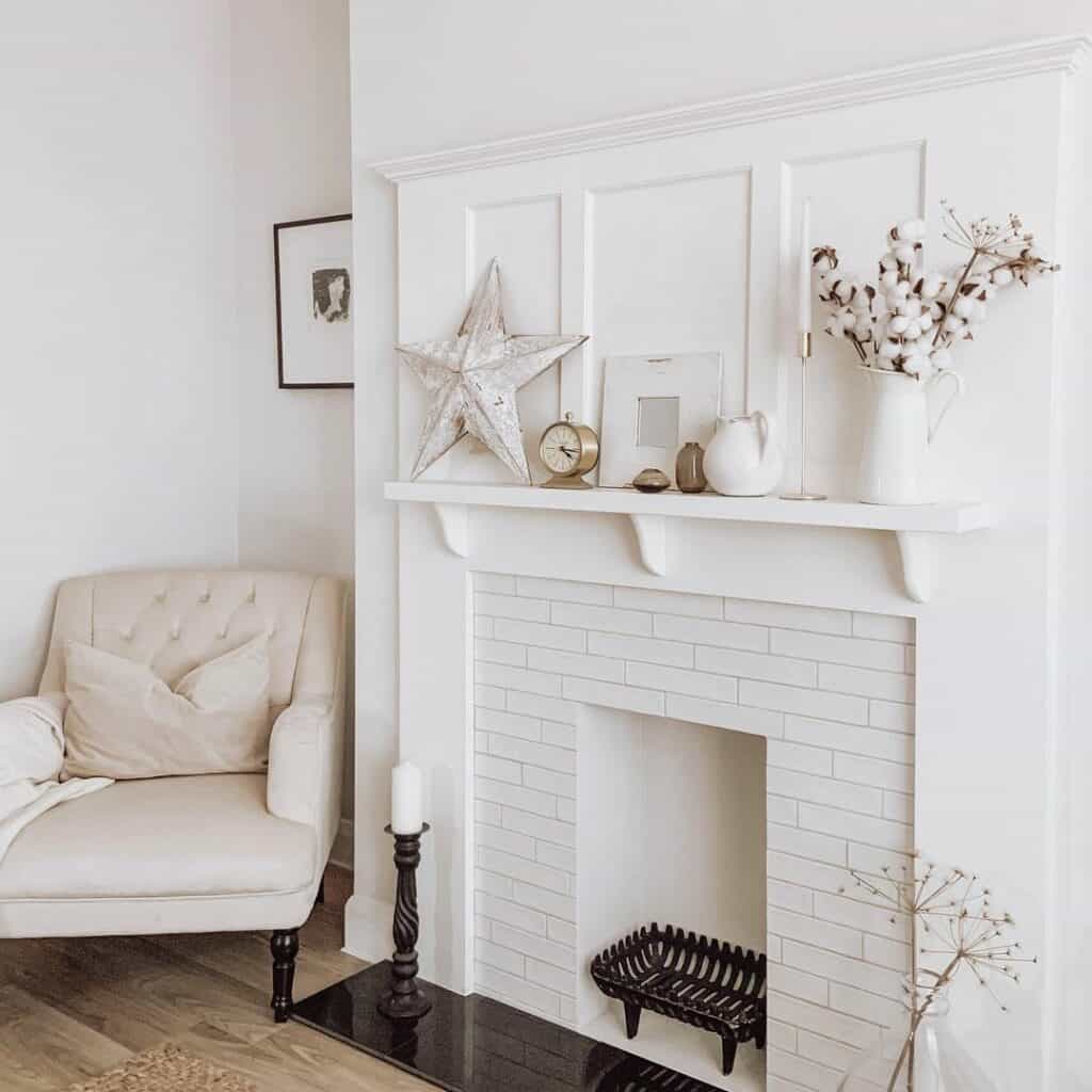Elegant White Fireplace With Cotton Branch Décor