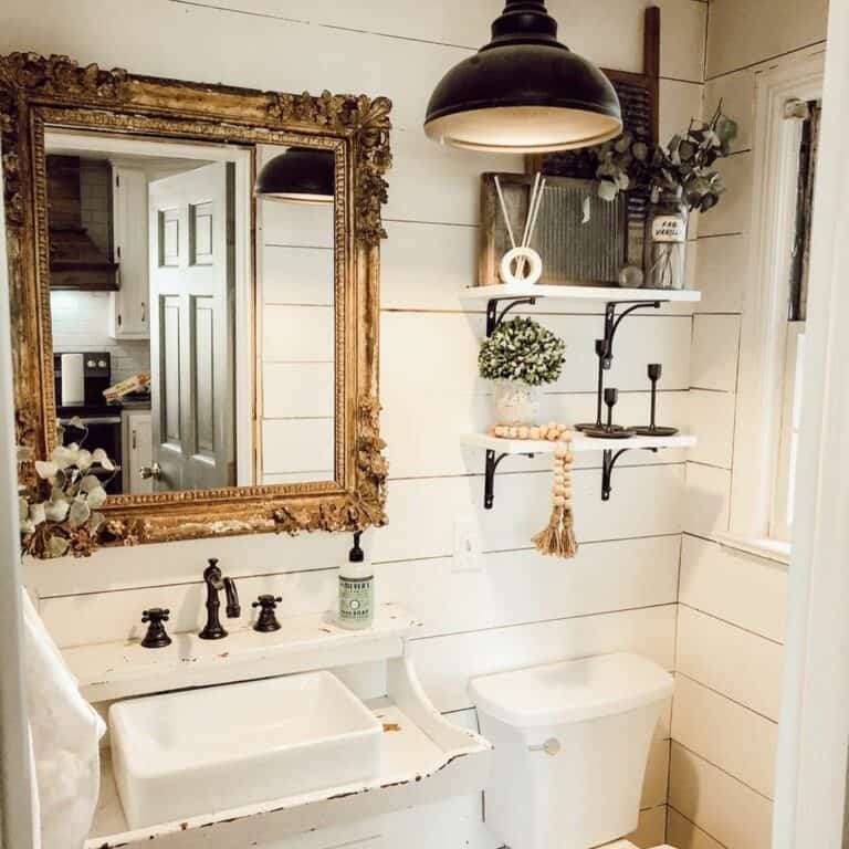 Embellished Mirror for a Compact Bathroom