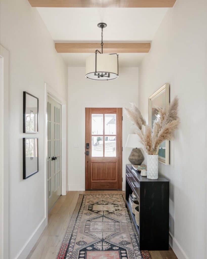 Entryway With Black and Wood Accents