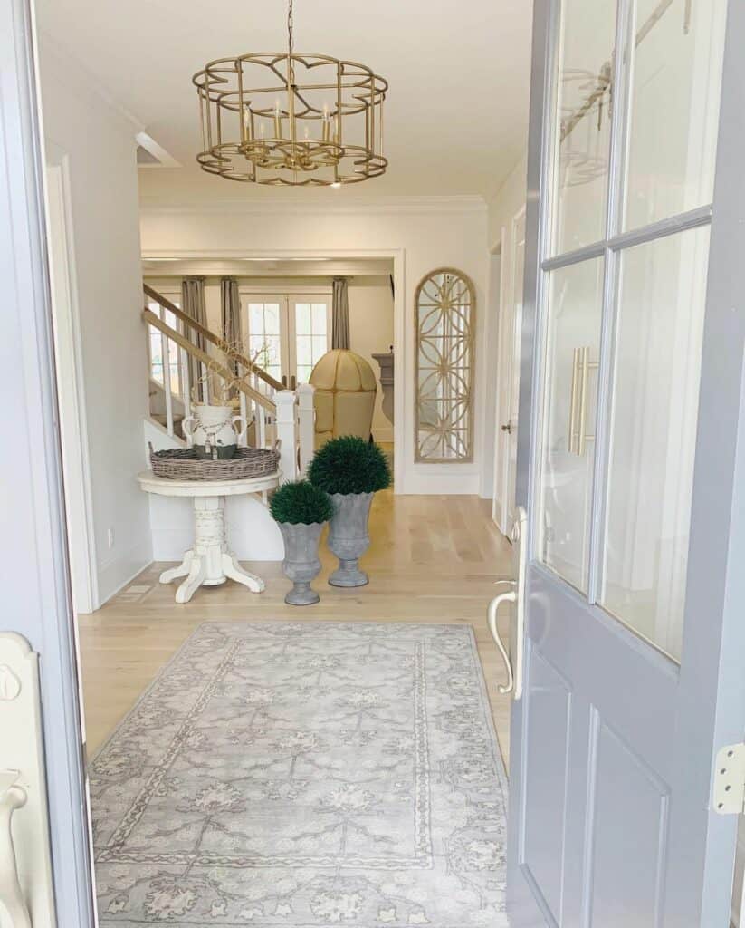 Entryway With Brass Modern Chandelier