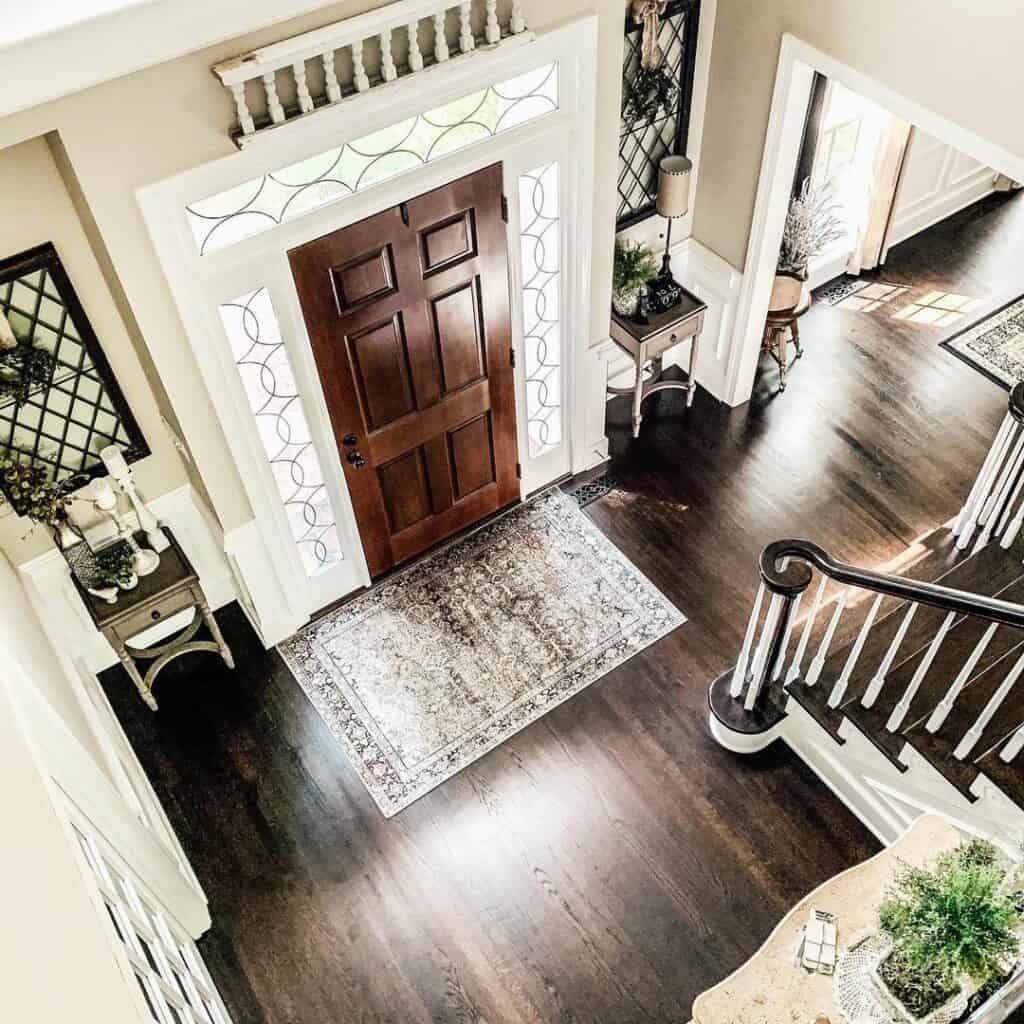 Espresso Wood Flooring Inspiration for a Warm-toned Entryway