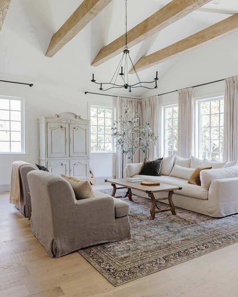 Exposed Beams With High Ceiling Chandelier