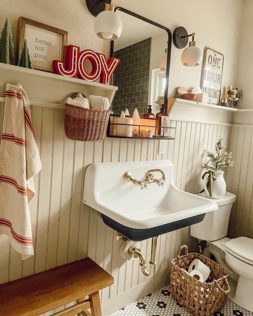Farmhouse Bathroom With White Wainscoting and Festive Accents