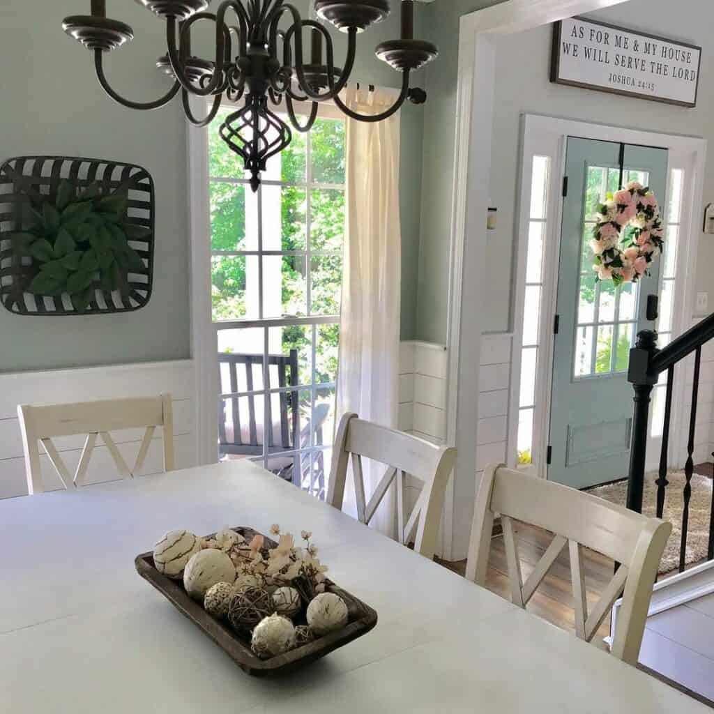 Farmhouse Dining Room With Black Chandelier