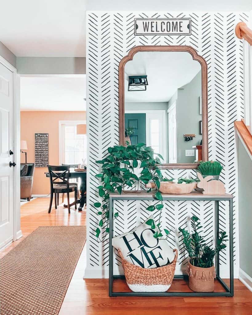 Farmhouse Entryway With Black and White Herringbone Wallpaper