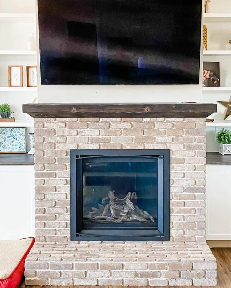 Farmhouse Hearth With Built-in Shelves
