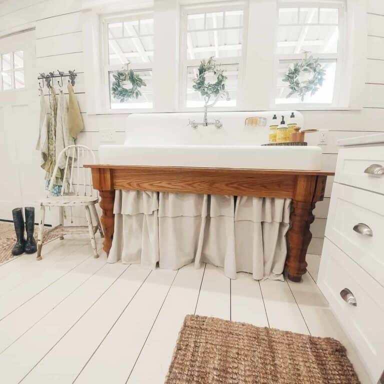 Farmhouse Kitchen Sink With Wreaths on Windows