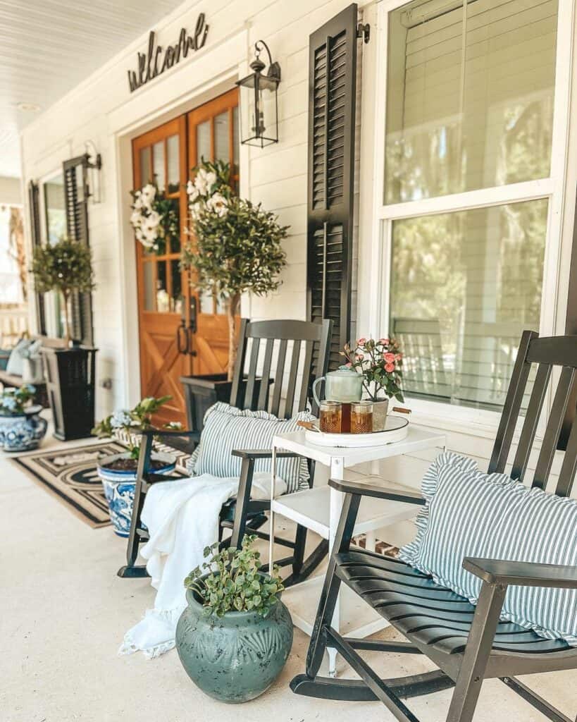 Farmhouse Porch With Lantern Sconces