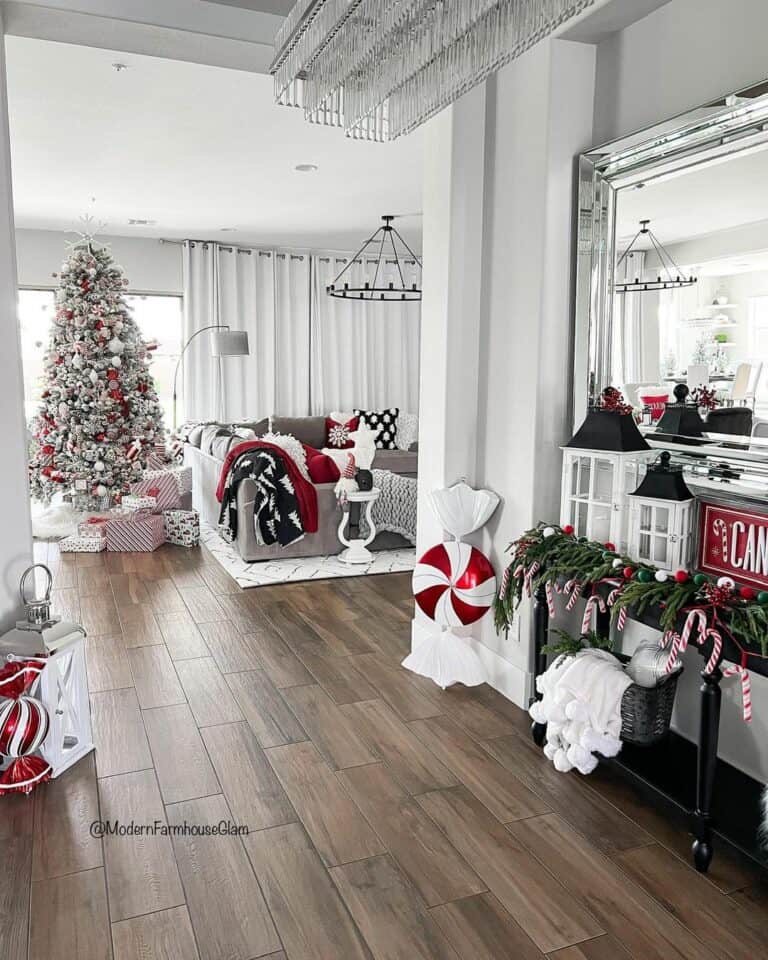 Festive Entryway With View of Christmas Tree