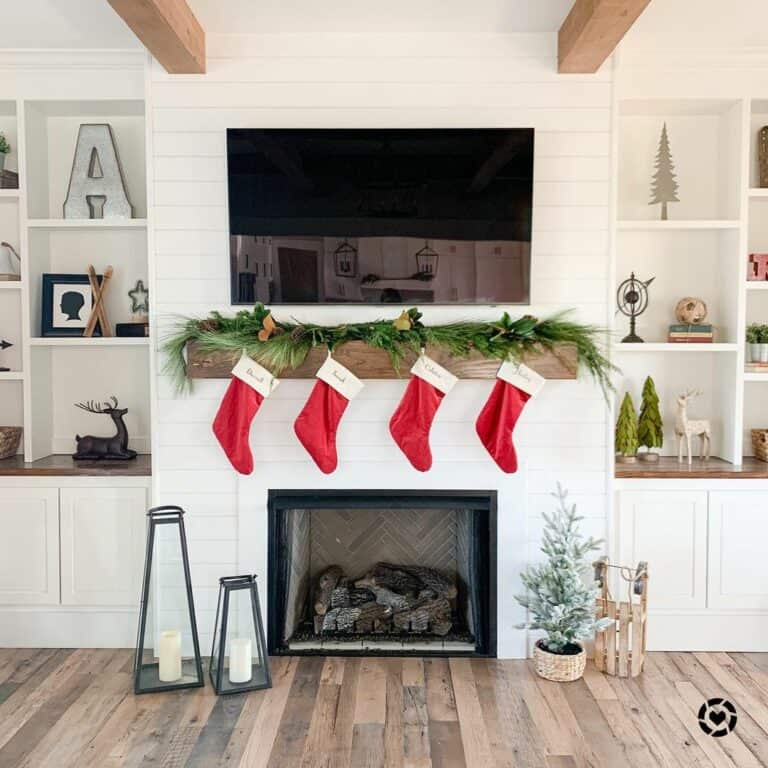 Festive White Fireplace With Black Accents
