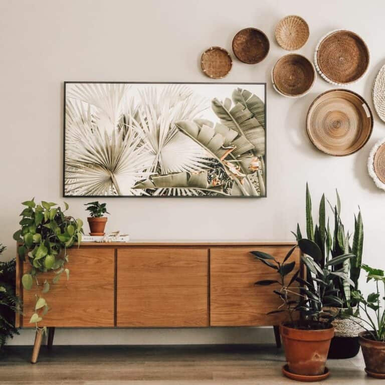 Foliage Placed Around Wooden Sideboard