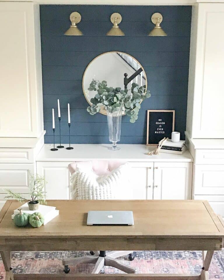 Gold Sconces on a Blue Shiplap Accent Wall