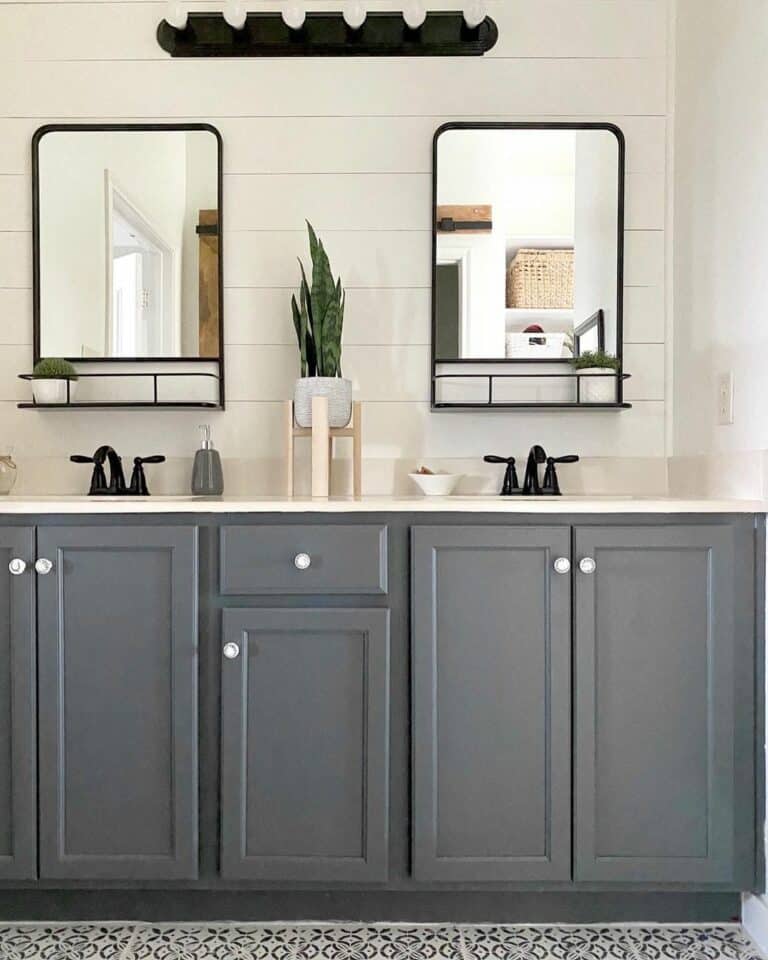 Gray Bathroom With Black Metal Vanity Mirrors