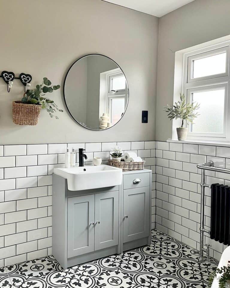 Gray Bathroom With Patterned Tile Floor