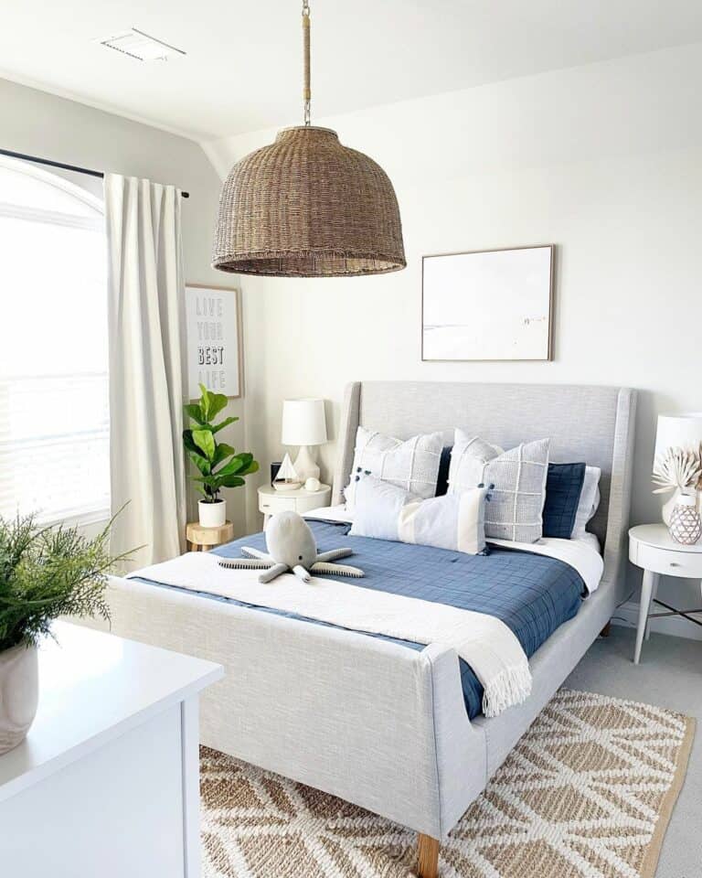 Gray Upholstered Bed With Rattan Light Fixture
