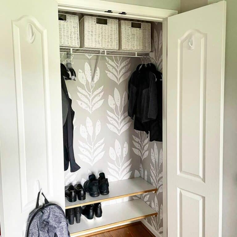 Gray and White Wallpaper Closet With Shelves