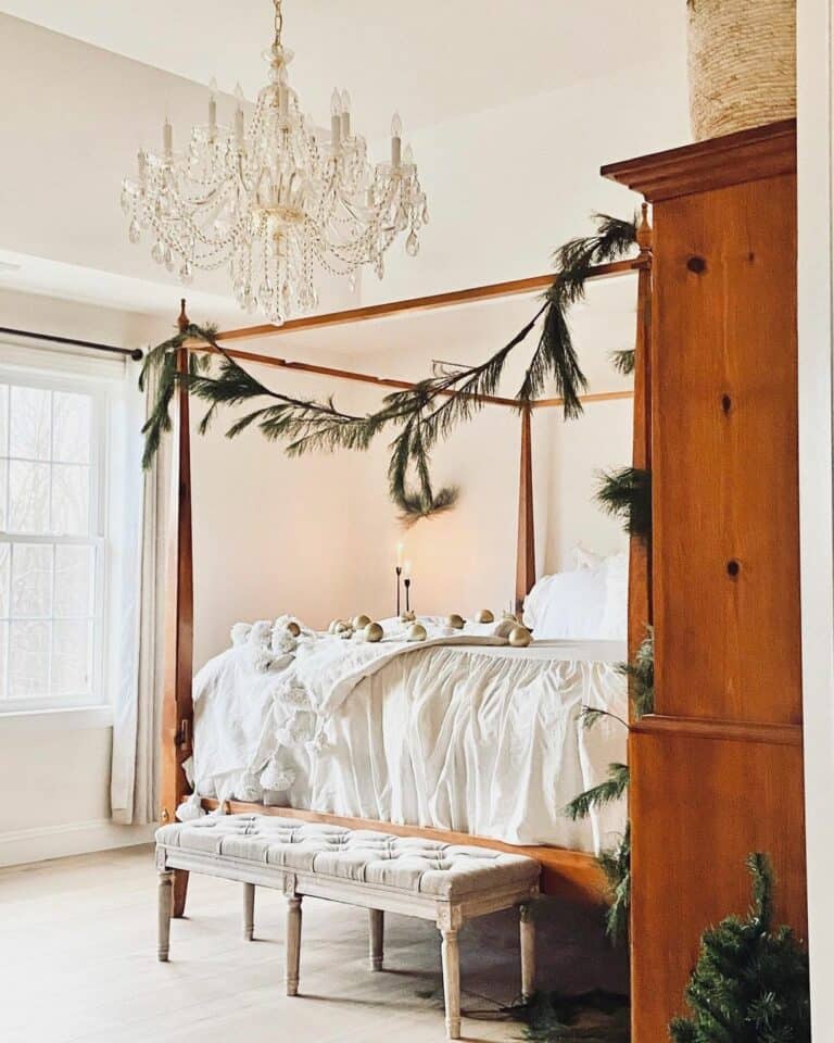 Green Garland Draped Over Four-Poster Bed