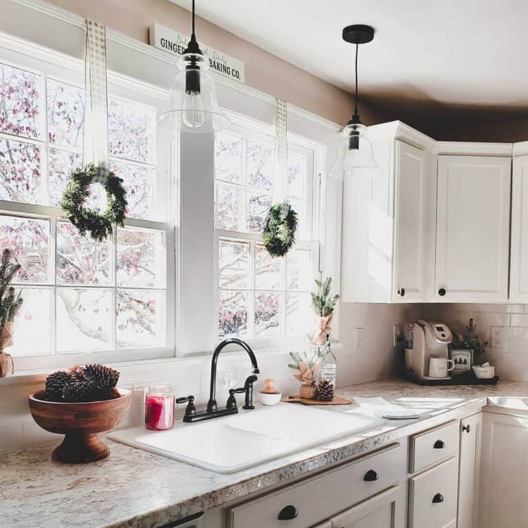 Greige Farmhouse Kitchen With Wreaths on Windows