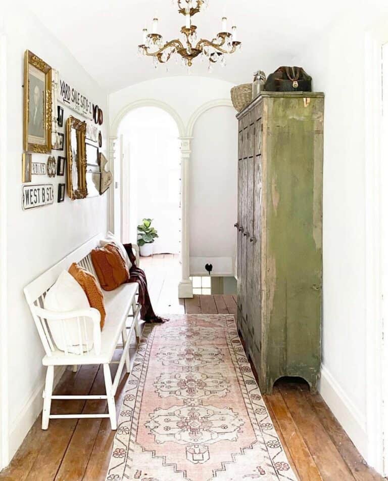 Hallway With Pink Runner and Green Cabinet