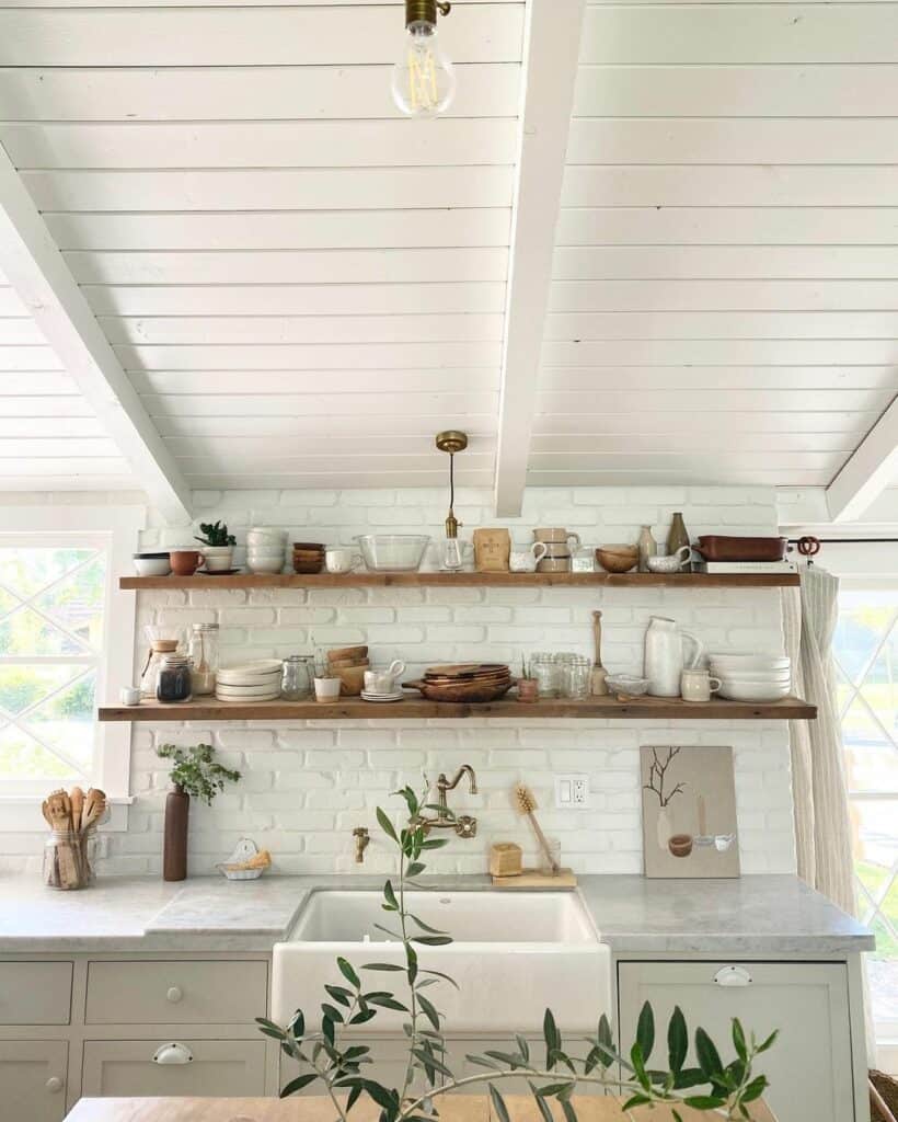 Kitchen With Elongated Wooden Open Shelvings