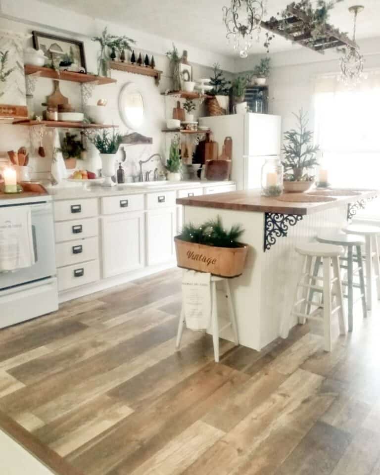 Kitchen With Greeneries and Wooden Accents