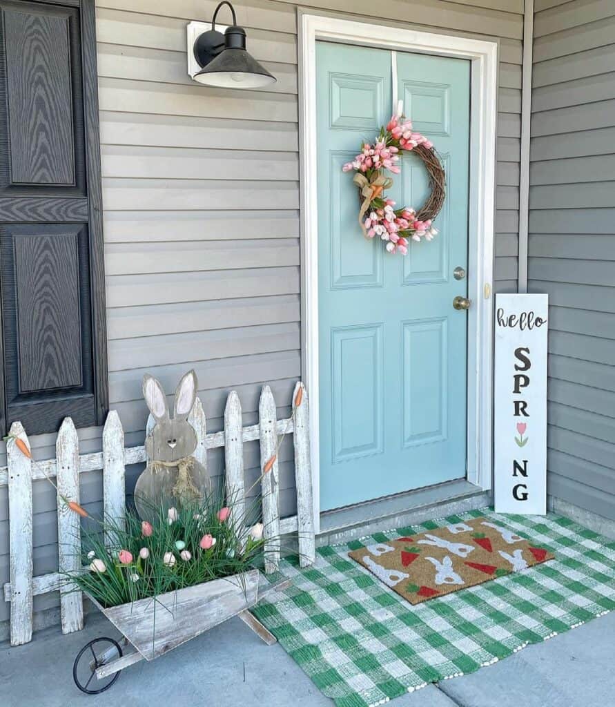 Light Blue Door With Pink Floral Spring Wreath